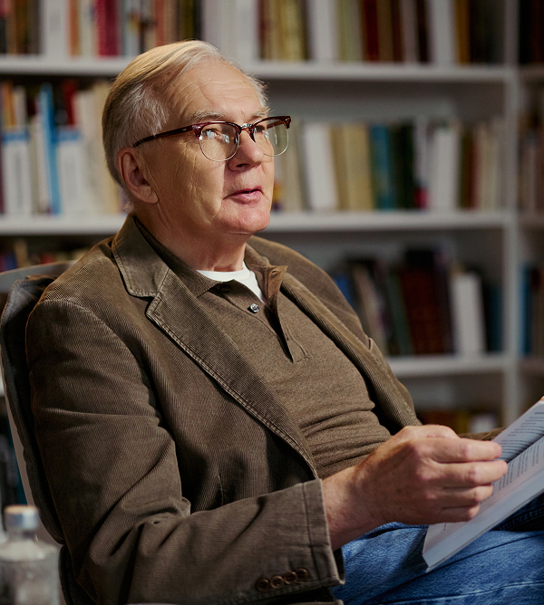 elderly man reviewing documents